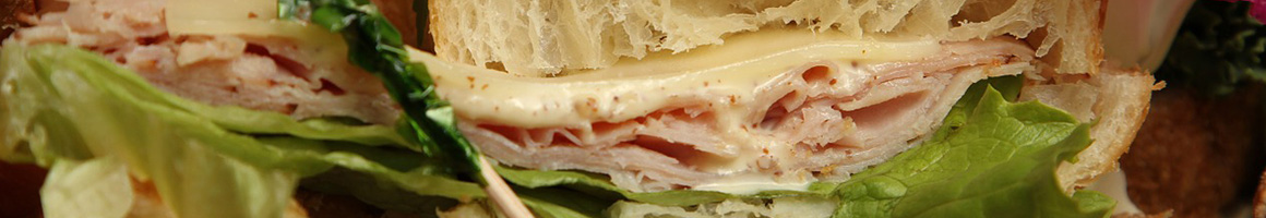 Eating Sandwich at Submarina restaurant in Vista, CA.